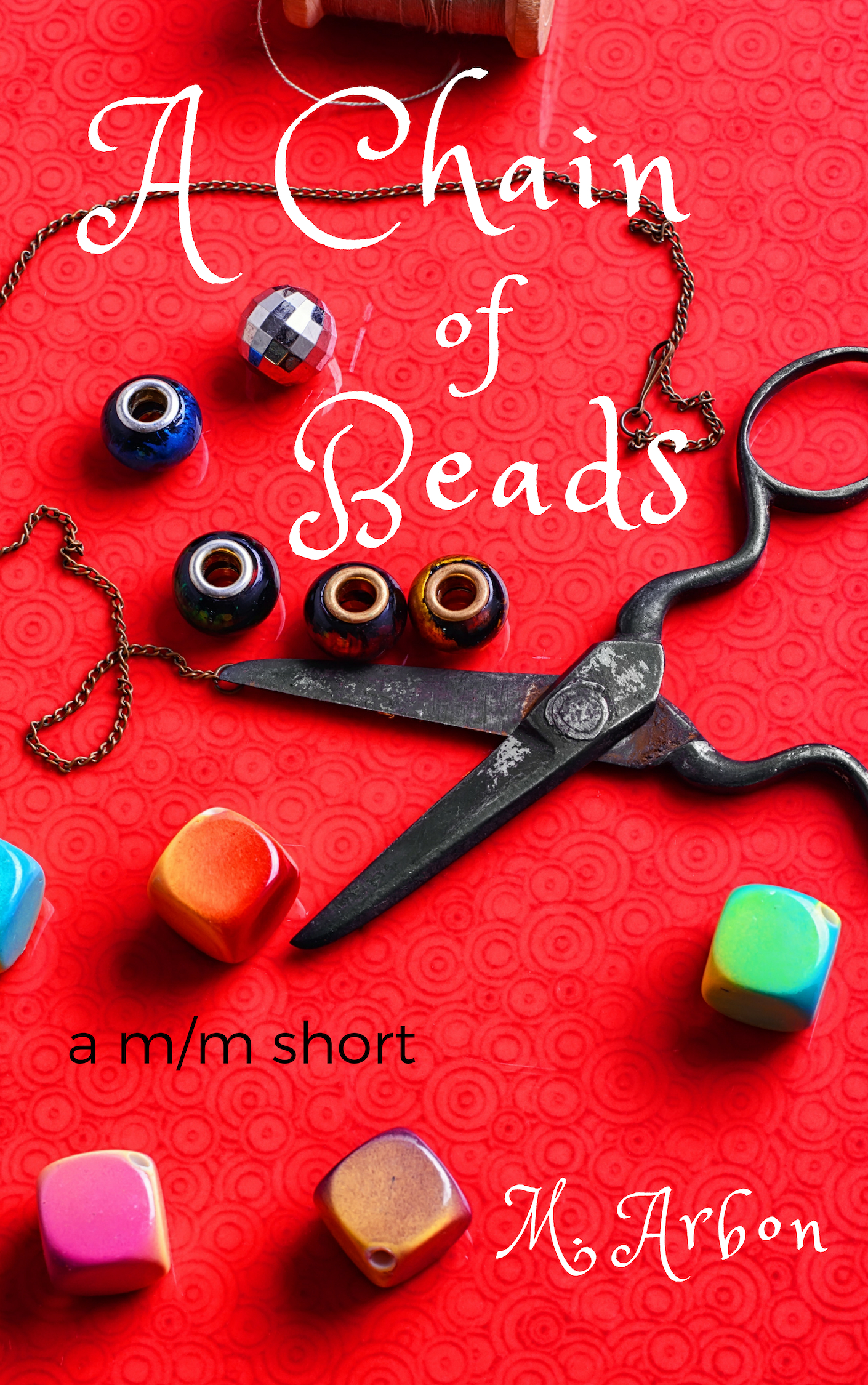 Cover of A Chain of Beads, showing beads and scissors.